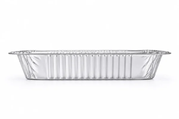 Side profile of a half size 65 mm deep aluminum foil steam table pan