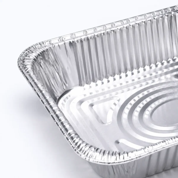 068-half-size-medium-aluminum-foil-steam-table-pan-structure-detail.png Close-up of the rim and wrinklewall structure of a half size medium aluminum foil steam table pan