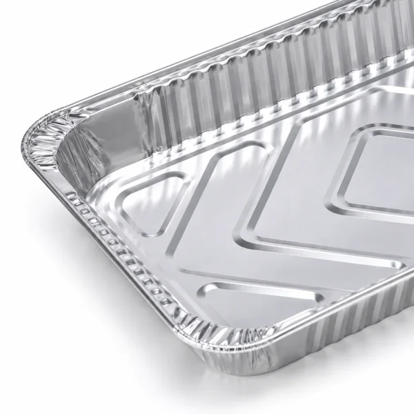 Aluminum Foil Steam Table Pan – Structure Detail Close-up of the aluminum foil steam table pan showing the rolled rim, formed corner, wrinklewall side and embossed base detail.