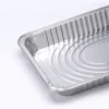 aluminum-foil-steam-table-pan-structure-detail.webp Close-up of the aluminum foil steam table pan showing the crimped rim, formed corner, wrinklewall side and concentric embossed base.