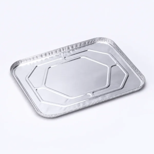 Angled view of half size aluminum foil steam table pan lid