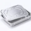 Half size aluminum foil steam table pan lid shown with compatible steam table pan