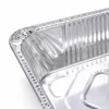half-size-extra-deep-aluminum-foil-steam-table-pan-rim-detail.webp Close-up of the rim and sidewall detail of a half size extra deep aluminum foil steam table pan.